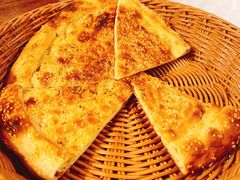 馕丁炒烤肉-巴依老爷新疆餐厅
