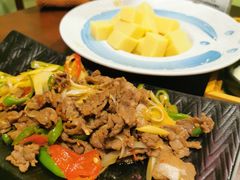 酸木瓜炒牛肉-紫滇源云南生态菜(丹凤街店)