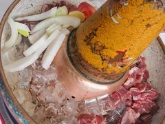 -毛辣果·贵州红酸汤牛肉火锅(西单店)