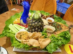 -沐毫傣泐云南菜孔雀宴•手抓饭傣味烧烤(曼听公园店)