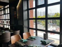 -曼听小寨海鲜烧烤·大连辣炒大王(盖州街店)