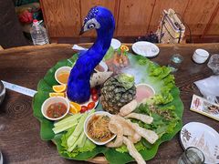 -沐毫傣泐云南菜孔雀宴•手抓饭傣味烧烤(曼听公园店)