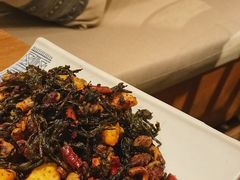 普洱茶炒包浆豆腐-云海肴·汽锅鸡·云南菜(天山百盛优客店)