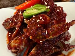 草家招牌酱辣蟹-草家酱蟹炭火烤肉店(珲春南路一店)