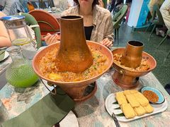 土司铜锅油焖鸡-浩海火烧云傣家菜(京广店)
