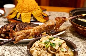 Lamb Skewers on Red Willow Wood