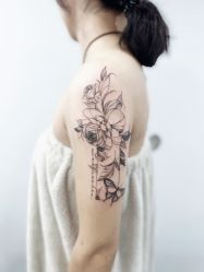 -龙之吻专业刺青·手工耳洞·纹身去色