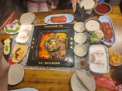 -老牌坊云南鱼豆花火锅(哈西万达店)