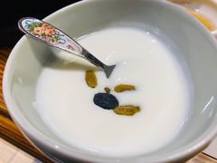 酸奶-草家酱蟹炭火烤肉店(珲春南路一店)