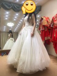 -觅白婚纱礼服馆