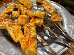 -明何记涮牛肚(品牌首店隋唐植物园南门古城路店)