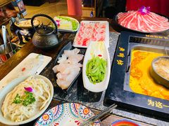 -老牌坊云南鱼豆花火锅(哈西万达店)
