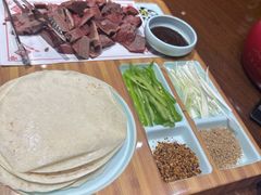 -乔家小院•非遗驴肉•本地小海鲜(滨河路店)