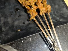 -明何记涮牛肚(品牌首店隋唐植物园南门古城路店)