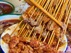 -拈签一笑黄牛肉辣卤串串