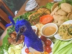 -沐毫傣泐云南菜孔雀宴•手抓饭傣味烧烤(曼听公园店)