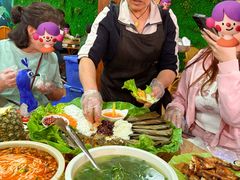 -沐毫傣泐云南菜孔雀宴•手抓饭傣味烧烤(曼听公园店)