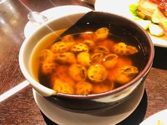 古越陈酿煮花螺-杭州西子湖四季酒店·金沙厅