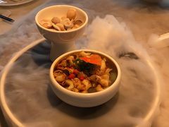 辣酒汁花螺配夏威夷果-木守西溪溪隐餐厅