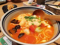版纳番茄酸汤鱼米线-刀小蛮半只鸡过桥米线(家乐福四元桥店)