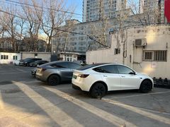 -北亚国超特斯拉授权钣喷中心