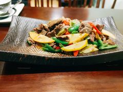 酸木瓜炒牛肉-紫滇源云南生态菜(丹凤街店)