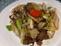 葱爆羊羔肉-巴扎美食·新疆菜·西域歌舞表演餐厅(新疆大厦店)
