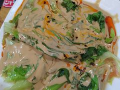 -明何记涮牛肚(品牌首店隋唐植物园南门古城路店)