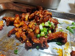 云南爆辣生烤鸡爪-一家破烧烤店·辣卤海鲜·小排档(光谷店)