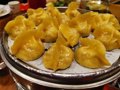 玉米面酸菜蒸饺-那家老院子东北菜·饺子·小鸡炖蘑菇(艳华街店)