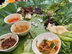 -沐毫傣泐云南菜孔雀宴•手抓饭傣味烧烤(曼听公园店)