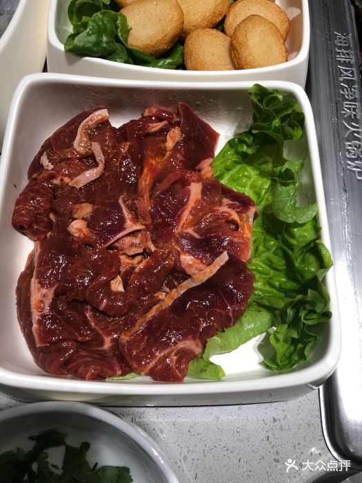 海底捞火锅(吉利大厦店)捞派滑牛肉图片 - 第1张