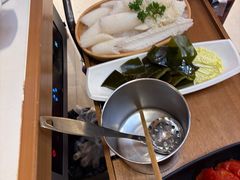 -老牌坊云南鱼豆花火锅(哈西万达店)