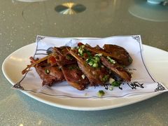 香辣鸭头-新天明砂锅鱼头煲