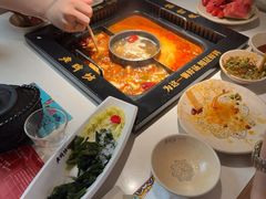 -老牌坊云南鱼豆花火锅(哈西万达店)