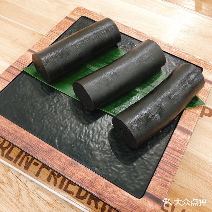 喜喜酒家·纯手工点心·粤菜香滑黑芝麻卷图片