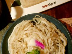 -老牌坊云南鱼豆花火锅(哈西万达店)
