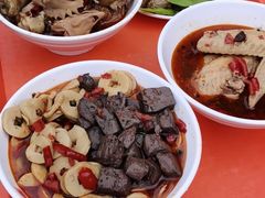 -梁老三麻辣鸡头总店