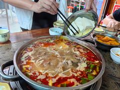 -黄利砖万峰林布依特色酸笋牛肉馆