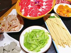 -明何记涮牛肚(品牌首店隋唐植物园南门古城路店)