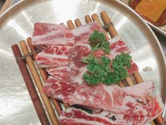 -草家酱蟹炭火烤肉店(珲春南路二店)
