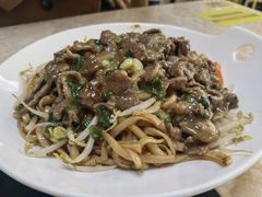 湿炒牛肉粿条-华威达牛庄(黄埔大道西店)