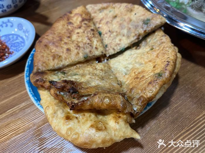 冯四孃跷脚牛肉·非物质文化遗产店红糖饼图片