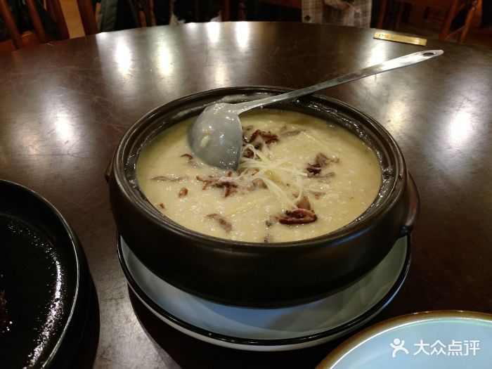 民国往事餐厅(新百店)兰芳咸蛋黄烤鸭粥图片 - 第1张