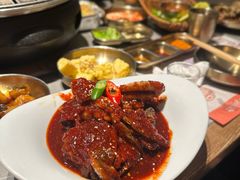草家招牌酱辣蟹-草家酱蟹炭火烤肉店(珲春南路一店)