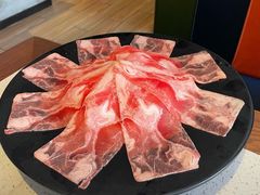 谷饲肥牛-九府羊·鲜羊火锅·烤串(新华路店)