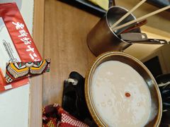 -老牌坊云南鱼豆花火锅(哈西万达店)