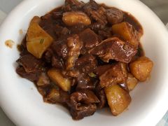 土豆烧牛腩-华春餐馆(鱼山路店)