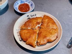 牛肉烤饼-肖四女乐山跷脚牛肉(江北星街坊店)