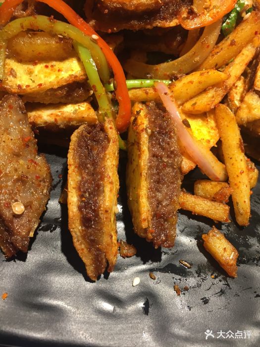 西域楼兰新疆主题餐厅椒盐牛肉夹沙图片